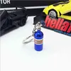 Keychains verkopen belangrijke creatieve metalen turbine cartoon nrs auto -onderdelen stikstofcilinder