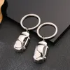 Luksusowy Mini Niemiecki Wisiorek wisiorek w kształcie samochodu Keychain Metal 3D Pojazd Key Key Holders Decor Akcesoria