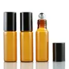 Groothandel 100 stuks / partij 5 ml roll op draagbare amber glas navulbare parfumfles lege essentiële olieverhaal met aluminium dop