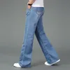 Dżinsy Mężczyźni Męskie Modis Duże Flared Jeans Boot Cut Leg Flared Luźne Fit High Paist Mężczyzna Designer Classic Blue Denim Jeans 20117