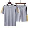 Trajes de chándal de los hombres del verano Camisetas Pantalones cortos Conjuntos Poliéster Fashioin Chándales masculinos Camiseta Bermuda Masculina Pantalones cortos Patchwork LJ201126