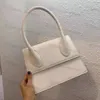 large suede handbag