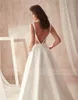 Plus sexiga billiga klänningar med fick Satin Deep V-Neck öppen bakre golvlängd Bröllopsklänning Brudklänningar Robes de Marie