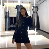 Chándales de mujer Otoño Invierno diseñadores de marca conjunto de dos piezas ropa mujer 2021 elegante cárdigan de punto de doble botonadura + Mini falda Set1