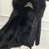 Moda negro piel de mapache ribete mukla pieles marca negro piel de zorro forrado negro mini parka chaquetas cálidas abrigos de nieve de invierno