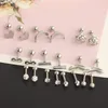 16g rostfritt stål Moon Heart Cross Rose Ear Barbell Helix Tragus Brosk örhänge Set Body Piercing Smycken för män och kvinnor5006156