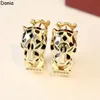 Donia jewelry luxury stud European and American fashion double ring leopard titanium steel micro-set zircon three-color creative designer earrings