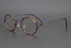 Occhiali rotondi unisex retro-vintage super leggeri montatura in titanio puro 47-22-145 occhiali da vista alti senza viti designer set completo cas