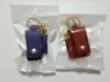 NIEUW 30 ml Hand Sanitizer flesomslag PU Leather Tassel Holder Keychain Proteerbare sleutelhanger opslagtassen Home Storage Organisatie