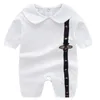 デザイン生まれたばかりの赤ちゃん男の子の女の子ロンパースの小さな蜂白い濃い青い綿のジャンプスーツラペルス長袖の幼児幼児の服