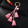 Koreanska sammet tofset nyckelring läder tassel pärla pendant bil smycken kvinnlig nyckel kedja plysch väska hänge handväska smycken gåva