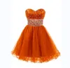 Sexiga Sweetheart Ärmlös Homecoming Klänningar Beaded En Linje Ruffles Tulle Short Cocktail Dress Party Gowns