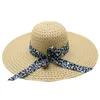 Cappello a bombetta da viaggio a tesa larga da spiaggia pieghevole da donna con stampa leopardata e fiocco da donna