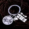 Ny Vikt Lifting Keychain Barbell Nyckel Kedja Viktplatta Charm Villkor Personliga Trainer Lovers Gåvor Gratis Frakt