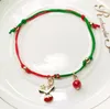 Bracelets de ficelle de Noël rouge avec des arbres de fête de neige de cerf de père Noël Bracelets d'enveloppement réglables ornement de Noël cadeau de nouvel an