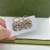 Brincos de encanto de diamante de arco chique Rhinestone Carta dupla Designer Eardrops com selos Mulheres pingant studs caixa de presente