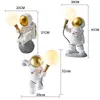 Lampy stołowe astronauta Lampa biurkowa żywica Nordic Sypialnia Light Home Decoration Salon Room Decor Space Man