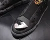 Scarpe da uomo primaverili e autunnali Scarpe da tavola britanniche moda giovanile all-match rivetto piatto marea scarpe da uomo firmate di marca Zapatos Hombre A6