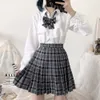 Estilo formal japonês Ortodoxo Preted Skirt Estudante JK Uniforme Curto Saias Curtas Grade Hight Cintura Pocket Bust Bust Skirt 201110