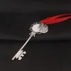 Рождественская снежинка ключ -цепь подвесная вечеринка украшение магии Санта -Клаус Рождественский