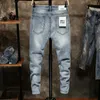 Zerrissene Jeans Männer dünne hellblaue High Street Street Street Style Jeans Elastizität Schlanker Fit Franed Casual Men Hosen Hosen Biker Jeans T2712