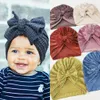 Solid Ribbed Velvet Baby Vinter Hat Bow Topknot Nyfödda Mössor Sweet Tuban Headwrraps Boys Tjejer Hårtillbehör