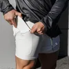 Мужчины носят шорты карманы с двумя паутинами быстрой сухой тренажерой Shorts Trunts Fitness Tight Jogging Man SE61