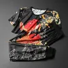 2020 Uomini di estate Tuta Mens Sportswears Stile cinese Imposta uomo O-Collo T Shirt + Pantaloni Beach Tee Shirts Maschio Stampa Felpe LJ201126