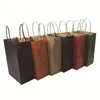 50pcs sac cadeau en papier kraft à la mode avec poignée / sacs à provisions / sac d'emballage marron de Noël / excellente qualité 21X15X8cm T200229