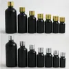 Glänzende schwarze Boston Round Travel Leere ätherische Öle und flüssige Kräuterglasflasche mit Aluminiumkappenstopfen 10 15 20 30 50 100 ml