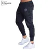 SiteWeie Mens Algodão Jogadores Esporte Corrida Calças Fitness Homens Sportswear Tracksuit Bottoms Skinny Sweatpants Gyms L247 201125