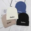 Cappello dobby lavorato a maglia da uomo Ricamo Lettera Berretti freddi Hip-hop Fashion street Lana Skull Caps Donna Primavera Autunno e Inverno casual