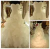 Gorgeous Organza Mermaid Wedding Dresses Tiered Skirt Designer Long Ruffles Wedding Gowns For Bride 2022 White Sleeveless Sweetheart Boho Bridal Dress