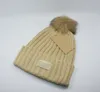 Hot Sale Ball Winter Warm Hat Märke Ladies Wool Beanie Kvinnor Män Designer Stickade hattar Gratis frakt