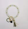 European och American Creative Fashion Beaded Pearl Bracelet PU Läder Tassel Koppar Pendant Keychain Factory Direktförsäljning