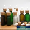 Frasco cuentagotas de vidrio transparente esmerilado de 10 ml con tapa de bambú Botella de vidrio de aceite esencial Botella de perfume verde esmerilado DHL SN1125
