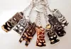 12pcs/LOT Jewelry Wholesale Cool totem Tiki man keyrings Keychains Car Key Rings for gift