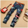 Jeans pour hommes Patchwork Denim bleu Locomotive pantalon broderie beauté Badge Cool élégant Design maigre droit mince 29-381