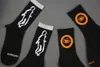 Three pairs of shadow alien orange eyes cotton sports tube Street trend socks for men and women