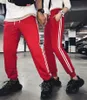 Primavera Outono Sweatpant Men Bolso Casual Fitness Solta Algodão Respirável Casal Unisex Calças de Tracksuit Plus Size 220311