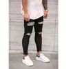 Man Hål Elasticitet Jeans Fashion Trend Pleaket Button Zipper Denim Trousers Designer Man Höst Ny All-Match Casual Skinny Pencil Byxor