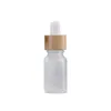 Dhgate 5 ml 10 ml 15 ml 20 ml 30 ml 50 ml 100 ml Frosted Clear Glass Parfum Oilflessen met bamboe houten deksel Boston rond glas serumolie Dispenser fles gratis schip