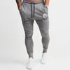 Mens tracksuit Bottoms joggers sport pants Gyms Thin fitness Skinny trousers Elasticity Running Pants Men Solid Casual pantalon LJ201104