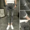 Wholesale Denim Jeans men's slim feet Casual pants trend Korean wild pants scratched holes ankle length beggar jeans 201128