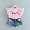 Menoea Girls Suits 2020夏スタイルの子供美しい花の花の袖の子供Oネック服ショートパンツのスーツ2pcs服LJ200916