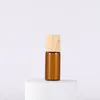 1ml 2ml 3ml 5ml Mini Roll On Glass Bottles with Metal Roller Balls And Plastic Wooden Grain Cap Refillable Aromatherapy Oil Bottle