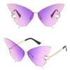 2021 Gafas de sol de ojo de gato de moda para mujeres Gafas de sol de gradiente de mariposa de gran tamaño de aleación sin montura únicas Sombras femeninas Azul Gris8653242