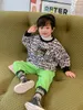 Kaszmirowy kaszmirowy wyściełany ciepły i sweter Koreańska wersja zimowych ubrań dużych dzieci i zagranicznych ubrań LJ201216