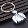 Le sac de chaîne Keychain Stereo Angel Keychain est suspendu pour femmes hommes de bijourie de mode.