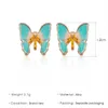 韓国の油絵の蝶スタッドのイヤリングメタルファッション動物の翼の耳の耳滴の女性のビジネスパーティーギフトイヤリングジュエリー